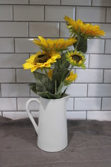 Sunflowers in white vase
