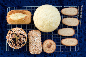 A variety of baked goods during quarantine on a dark blue background
