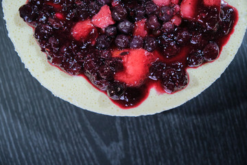 a cheesecake of red fruits