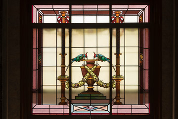 Stained glass, a couple of birds, in the Uruguayan Legislative Palace