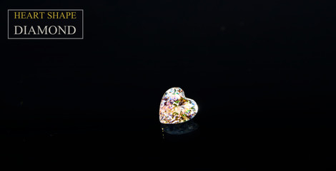 Heart shaped diamond
That has glitter on the black pin for making jewelry