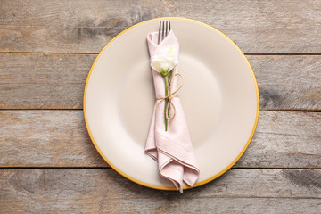 Beautiful table setting on wooden background