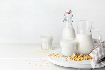 Different milk on white background