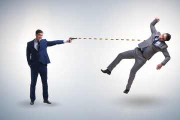 Businessman with gun threatening his competitor