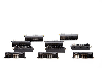 Electronic Components Concepts. Closeup of Rows of Long Angular PCB Connectors or Terminal Blocks...
