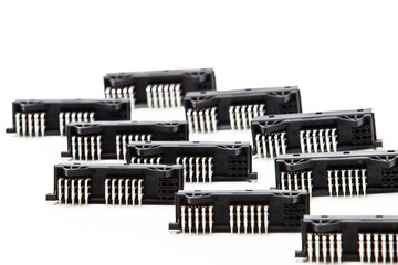 Electronic Components Concepts. Closeup of Rows of Long Angular PCB Connectors or Terminal Blocks...