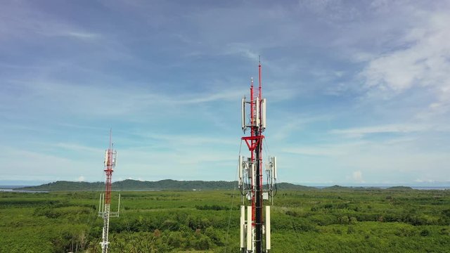 4G and 5G telecommunications tower aerial drone footage