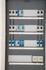 close up view of a Weber and Hager fusebox in a modern apartment building
