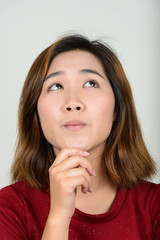 Portrait of young Asian woman with short hair