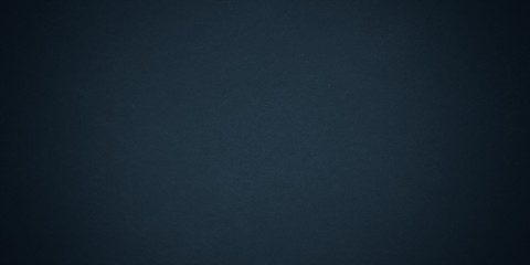 Texture of old navy blue grunge paper closeup