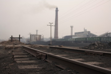 Fototapeta na wymiar industrial landscape with steam locomotive