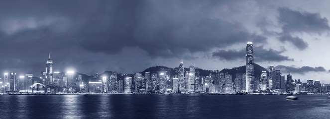 Fototapeta premium Panorama of Victoria harbor of Hong Kong city at dusk