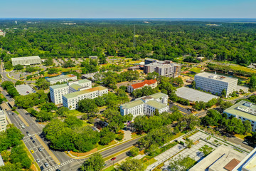 Fototapeta na wymiar Aerial photo Downtown Tallahassee Florida government buildings and green forest landscape