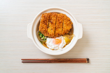 Japanese fried pork cutlet (katsudon) with onion soup and egg