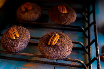 Baked chocolate chip cookies on an artistic background.