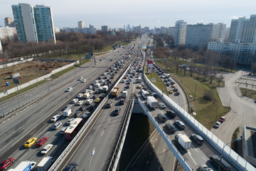 MOSCOW, RUSSIA - APRIL 15, 2020: An aerial view of a traffic congestion on an interchange of Mozhaiskoye Shosse and  Moscow Ring Road during the pandemic of the novel coronavirus disease (COVID-19)