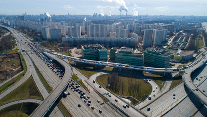 MOSCOW, RUSSIA - APRIL 15, 2020: An aerial view of a traffic congestion on an interchange of Mozhaiskoye Shosse and  Moscow Ring Road during the pandemic of the novel coronavirus disease (COVID-19)