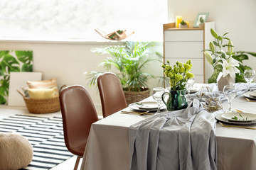 Served table in modern dining room