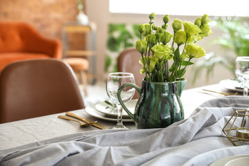 Served table in modern dining room