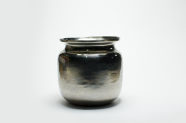 empty stainless steel jar on white