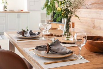 Served table in modern dining room