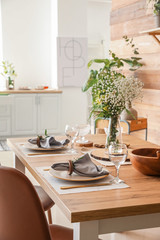 Served table in modern dining room