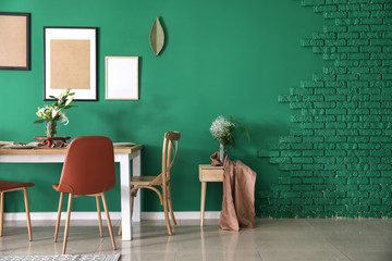 Interior of modern stylish dining room with floral decor