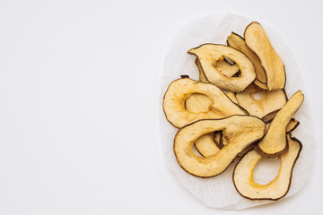 Vegetarian pear chips on a light background