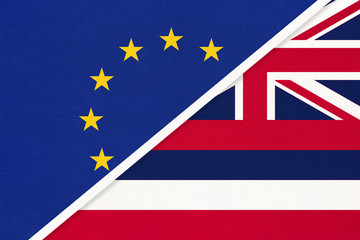 Fototapeta na wymiar European Union or EU vs Hawaii national flag from textile. Symbol of the Council of Europe association.