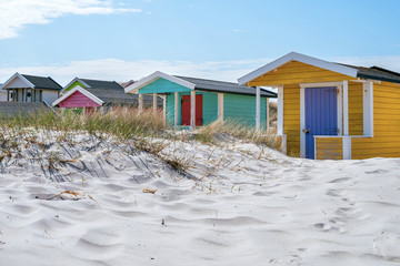 Beach huts or bath cottages on Skanor beach dunes and Falsterbo in South Sweden, Skane travel...