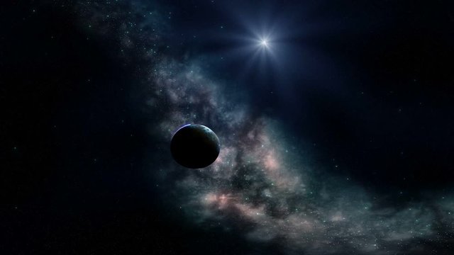 Alien Planet and Nebula. There are blue stars in the dark sky, a beautiful multi-colored nebula. A planet flies from the depths of space and is illuminated by a bright radiant blue star.
