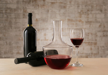 Glassware of tasty wine on table