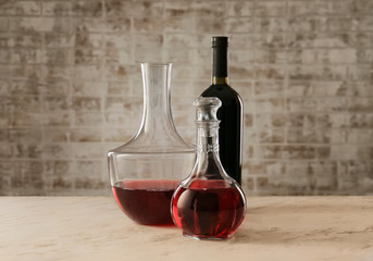 Glassware of tasty wine on table