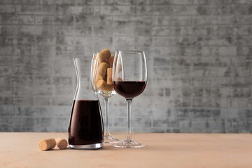 Decanter of wine and glasses on table