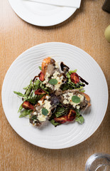 Crostini with sautéed forest mushrooms, garlic, basil and mozzarella.Traditional italian antipasti appetizer