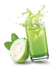 Glass of splashing guava juice with guava fruit on white background