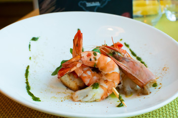 Shrimp, bruschetta with tomatoes, garlic and fresh basil