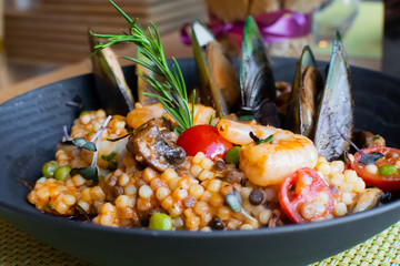 Bulgur, coucous pasta, green peas, lentil, cherry tomato, mussels and mushroom italian specialty