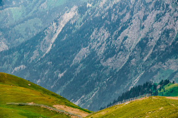 mountain landscape road high mountains with haze and clouds