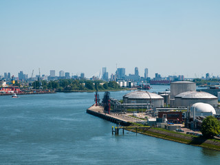 Rotterdam, Netherlands - May 07, 2020: view on the cargo port buildings infrastructure from cruise ship