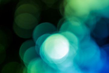 green and blue bokeh light in dark background