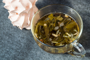 cup of leaf tea and zephyr