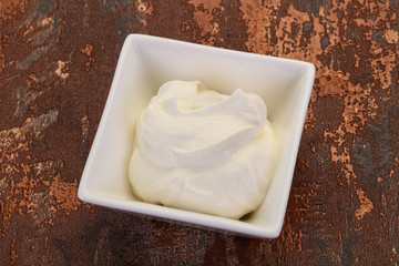 Sour cream in the bowl