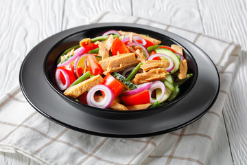 Healthy canned tuna salad with tomatoes, cucumber
