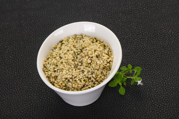 Peeled hemp seeds in the bowl