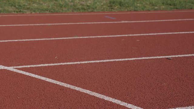 Runner on a running track and field