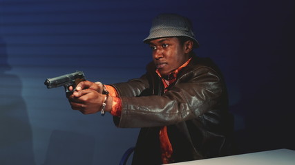 Close-up of black criminal grabbing the gun and threatening to harm cops. He trying to escape from...