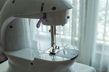 Mini sewing machine for the DIY craft. 
