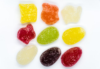 Colorful assortment of sweets, jelly beans on white background