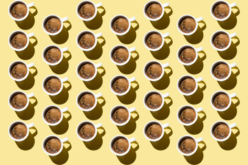 coffee on a yellow background, coffee cups, pattern